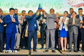 Le riz Ông Cua ST25 du Vietnam a remporté pour la troisième fois le concours "Meilleur riz du monde", lors de la 17ᵉ Conférence mondiale sur riz à Phnom Penh. Photo : Vietnamplus