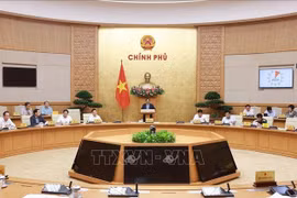Le Premier ministre Pham Minh Chinh a présidé dans l’après-midi du 1er octobre à Hanoï une réunion du gouvernement consacrée à l’évaluation et au suivi de la mise en œuvre du modèle d’administration locale à deux niveaux ainsi qu’à l’examen des difficultés rencontrées. Photo : VNA