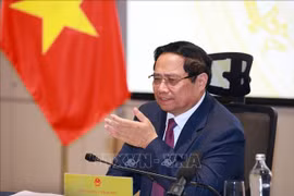 Le Premier ministre Pham Minh Chinh préside la réunion. Photo : VNA