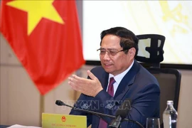Le Premier ministre Pham Minh Chinh préside la réunion. Photo : VNA