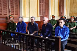 Les accusés au procès. Photo : VNA