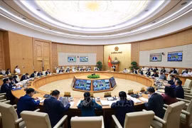 Panorama de la réunion mensuelle du gouvernement. Photo: VNA