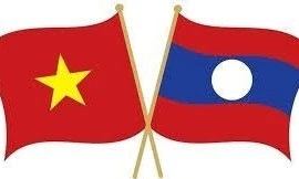 Coopération Vietnam-Laos dans l’organisation d’une foire de mise en relation commerciale