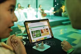 Découvrỉr la plateforme de commerce électronique nongsan.buudien.vn. Photo : VNA