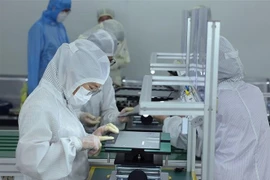 Les investisseurs étrangers ont enregistré un total de 21,5 milliards de dollars d'investissements au Vietnam au cours du premier semestre 2025. Photo : VNA