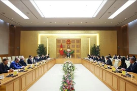 Lors de la rencontre. Photo : VNA