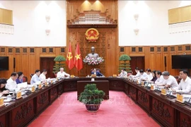 Le Premier ministre Pham Minh Chinh souligne la nécessité de réorganiser les services publics conformément aux orientations du Parti et aux exigences pratiques. Photo : VNA