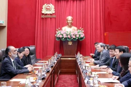 Lors d'une rencontre. Photo / VNA