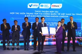 Accord de coopération entre le VIFC-HCMC et la Bourse de Londres visant à soutenir le développement du marché des capitaux au Centre financier international du Vietnam. Photo : VNA