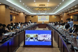 Lors d'une conférence à Hanoï le 4 août. Photo : VNA