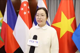 Lê Thi Anh Thu, étudiante en master à l’Université des Sports de Pékin, répond à une interview accordée à un journaliste de la VNA à Pékin. Photo : VNA