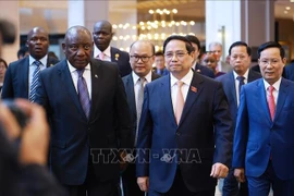 Le Premier ministre vietnamien Pham Minh Chinh participe au Forum d'affaires Vietnam-Afrique du Sud à Hanoï. Photo : VNA