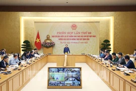 Lors de la réunion. Photo : VNA