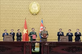 Cérémonie de signature de la lettre d'intention entre le ministère de la Défense du Vietnam et le ministère de la Défense nationale de la République populaire démocratique de Corée sur la coopération dans le domaine de la défense. Photo : VNA