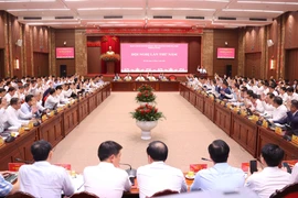 Lors de la conférence. Photo : VNA