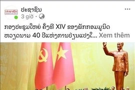 L’éditorial intitulé « Le 14e Congrès du Parti communiste du Vietnam, jalon des 40 ans du Renouveau », publié par le journal Pasaxon, organe du Parti populaire révolutionnaire lao. Photo / VNA