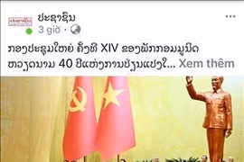 L’éditorial intitulé « Le 14e Congrès du Parti communiste du Vietnam, jalon des 40 ans du Renouveau », publié par le journal Pasaxon, organe du Parti populaire révolutionnaire lao. Photo / VNA