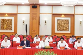 Le secrétaire général du PCV, To Lam, (centre) preside la réunion. Photo : VNA