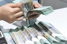 Plus de 959 milliards de dôngs de l'emprunt seront affectés au solde budgétaire de l'État. Photo baochinhphu.vn. 