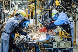Les fabricants vietnamiens ont de nouveau enregistré une croissance de leur production en décembre, prolongeant ainsi la période d'expansion actuelle à huit mois. (Photo vneconomy.vn)