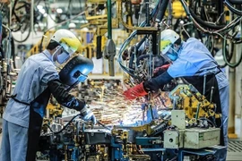 Les fabricants vietnamiens ont de nouveau enregistré une croissance de leur production en décembre, prolongeant ainsi la période d'expansion actuelle à huit mois. (Photo vneconomy.vn)