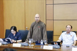 Selon le vénérable Thich Duc Thiên (délégation de Diên Biên), les électeurs, les bonzes et fidèles bouddhistes expriment leur joie et leur confiance dans la direction du Parti et de l’État. Photo : VNA