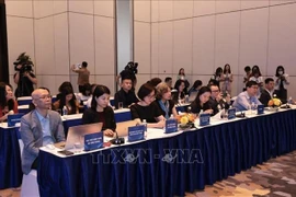 Des représentants des bureaux commerciaux vietnamiens à l’étranger lors de la Coférence. Photo : VNA