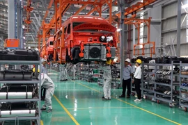 Activités de production à l'usine de fabrication et d'assemblage de voitures particulières de Kim Long Motor Hue Joint Stock Company dans la zone économique de Chan May - Lang Co (Phu Loc, Thua Thien - Hue). Photo : VNA