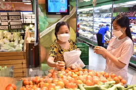 L'IPC vietnamien progresse de 1,14 % en février sous l'effet de la demande liée au Têt. Photo : VNA