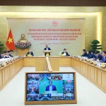 Vue d'ensemble de la conférence nationale, à Hanoi, le 30 décembre. Photo: VNA