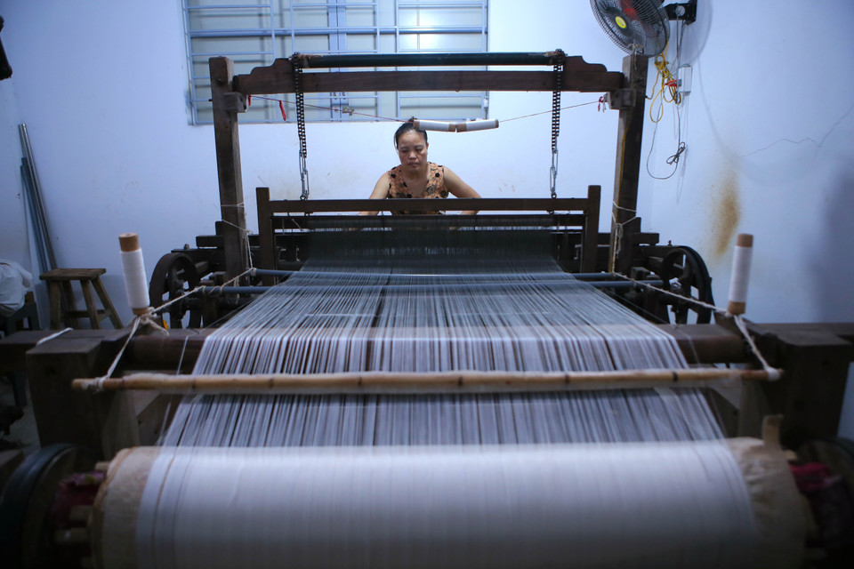 Un atelier de dévidage artisanal au village de Cô Chât, commune de Ninh Giang (Ninh Binh). Photo : VNA