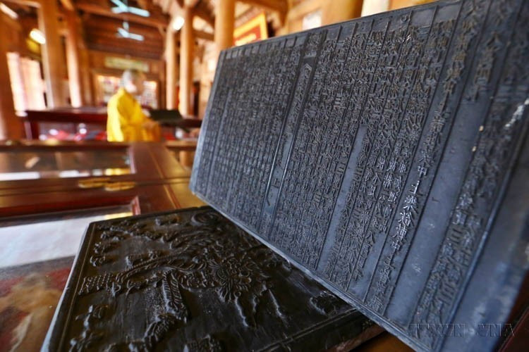 La pagode Vinh Nghiem conserve 3.050 tablettes de bois gravées de textes bouddhistes (Moc ban), lesquelles ont été inscrites en mai 2012 par l'UNESCO au Registre Mémoire du monde pour l’Asie-Pacifique. Photo: VNA