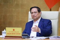 Le Premier ministre Pham Minh Chinh lors de la réunion. Photo: VNA