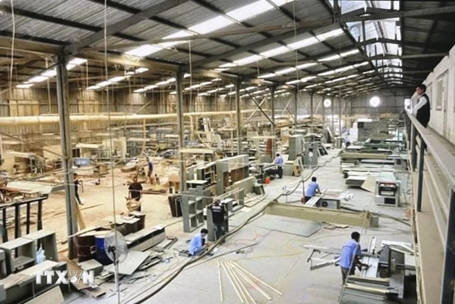 Une usine de production à Hô Chi Minh-Ville. Photo: VNA xuat-khau.jpg