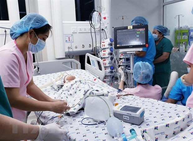 Ho Chi Minh-Ville: opération de séparation réussie des sœurs siamoises ảnh 2 Ho Chi Minh-Ville: opération de séparation réussie des sœurs siamoises ảnh 2