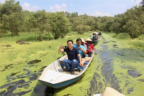 Visite printanière de la forêt de melaleuca Trà Su ảnh 1