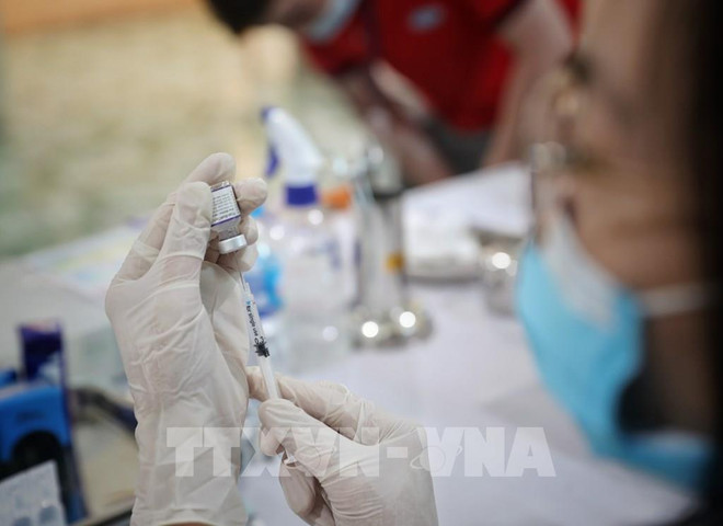 Covid-19: le Vietnam recense 702 nouveaux cas et un décès en 24 heures ảnh 1