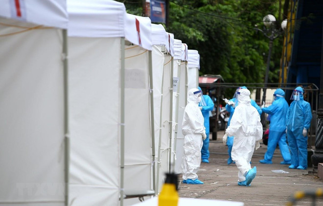 COVID-19 : Cinq nouveaux cas de contamination au Vietnam ảnh 1