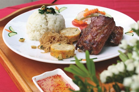 Déguster le com tâm de Saigon à l’hôtel Dê Nhât ảnh 1