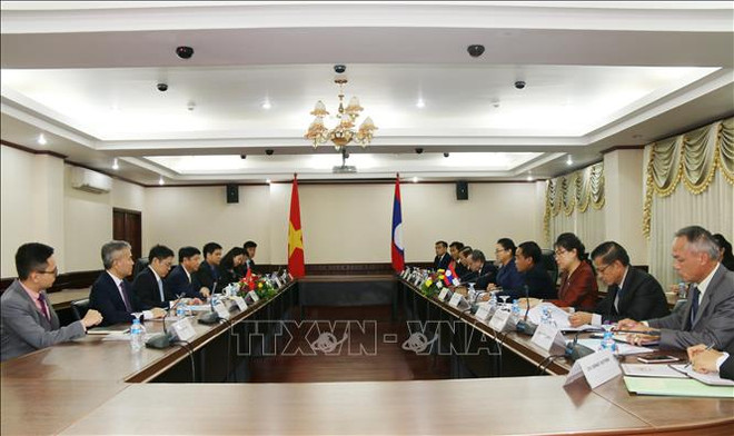 Une délégation du ministère vietnamien des Affaires étrangères au Laos ảnh 1 Une délégation du ministère vietnamien des Affaires étrangères au Laos ảnh 1