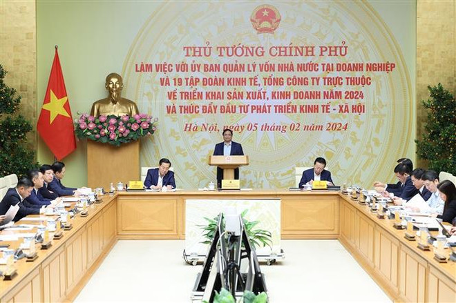 Le PM Pham Minh Chinh travaille avec 19 groupes et compagnies générales publics ảnh 1