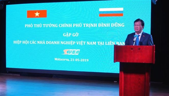 Le vice-PM Trinh Dinh Dung rencontre des entrepreneurs vietnamiens en Russie ảnh 1 Le vice-PM Trinh Dinh Dung rencontre des entrepreneurs vietnamiens en Russie ảnh 1