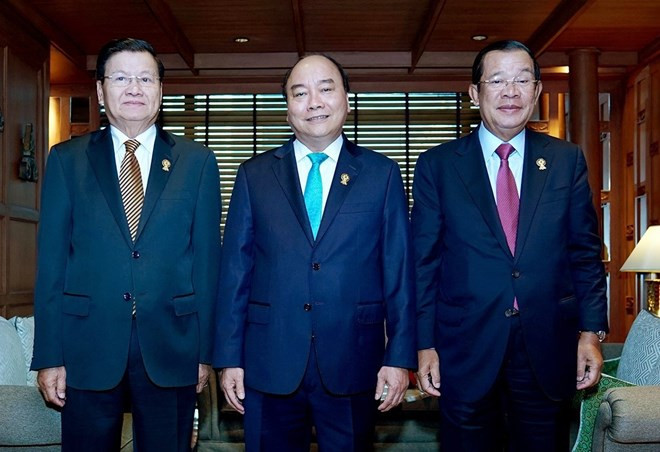 Le PM vietnamien rencontre ses homologues laotien et le cambodgien en marge du 34e sommet de l'ASEAN ảnh 1 Le PM vietnamien rencontre ses homologues laotien et le cambodgien en marge du 34e sommet de l'ASEAN ảnh 1