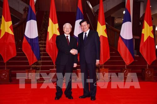 Le dirigeant vietnamien Nguyen Phu Trong rencontre des dirigeants laotiens ảnh 1 Le dirigeant vietnamien Nguyen Phu Trong rencontre des dirigeants laotiens ảnh 1