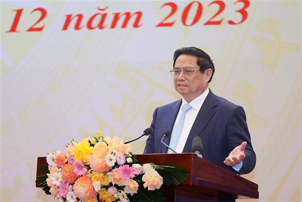 Le PM exhorte le développement des infrastructures de transport en 2024 ảnh 2