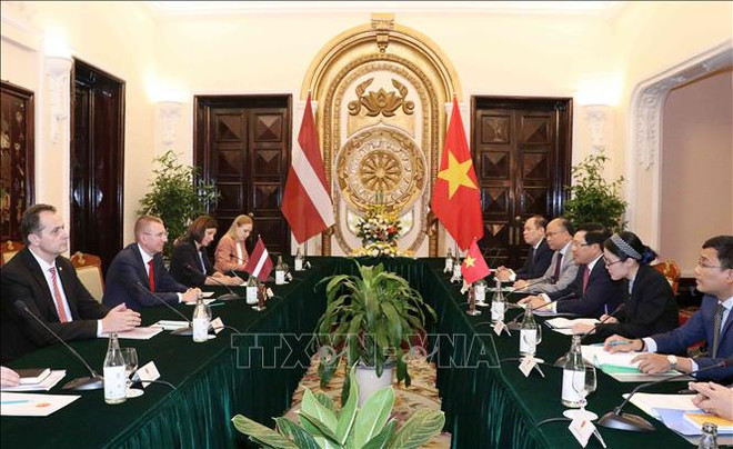 Le vice-PM et ministre des AE Pham Binh Minh s’entretient avec le ministre des AE de Lettonie ảnh 1 Le vice-PM et ministre des AE Pham Binh Minh s’entretient avec le ministre des AE de Lettonie ảnh 1