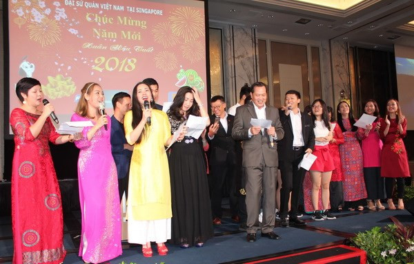 Les Vietnamiens à Singapour saluent le Têt traditionnel ảnh 1 Les Vietnamiens à Singapour saluent le Têt traditionnel ảnh 1