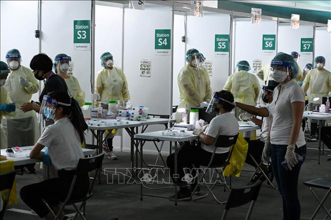 COVID-19 : le nombre de nouveaux cas à Singapour pourrait atteindre 20.000 cas/jour ảnh 1 COVID-19 : le nombre de nouveaux cas à Singapour pourrait atteindre 20.000 cas/jour ảnh 1
