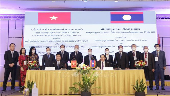Le Vietnam et le Laos s’engagent à booster leur commerce frontalier ảnh 2 Le Vietnam et le Laos s’engagent à booster leur commerce frontalier ảnh 2