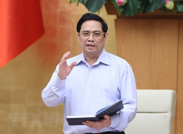 Le PM demande à toutes les forces de se concentrer sur la lutte anti-COVID-19 ảnh 1